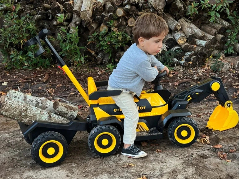 Kid getting off of the Little Ones First Digger by Tough Trucks for Kids