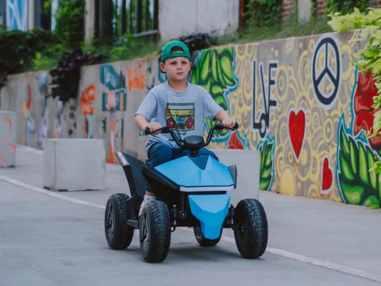 Kid Riding The Blue Mongoose ATV Quad by Tough Trucks For Kids