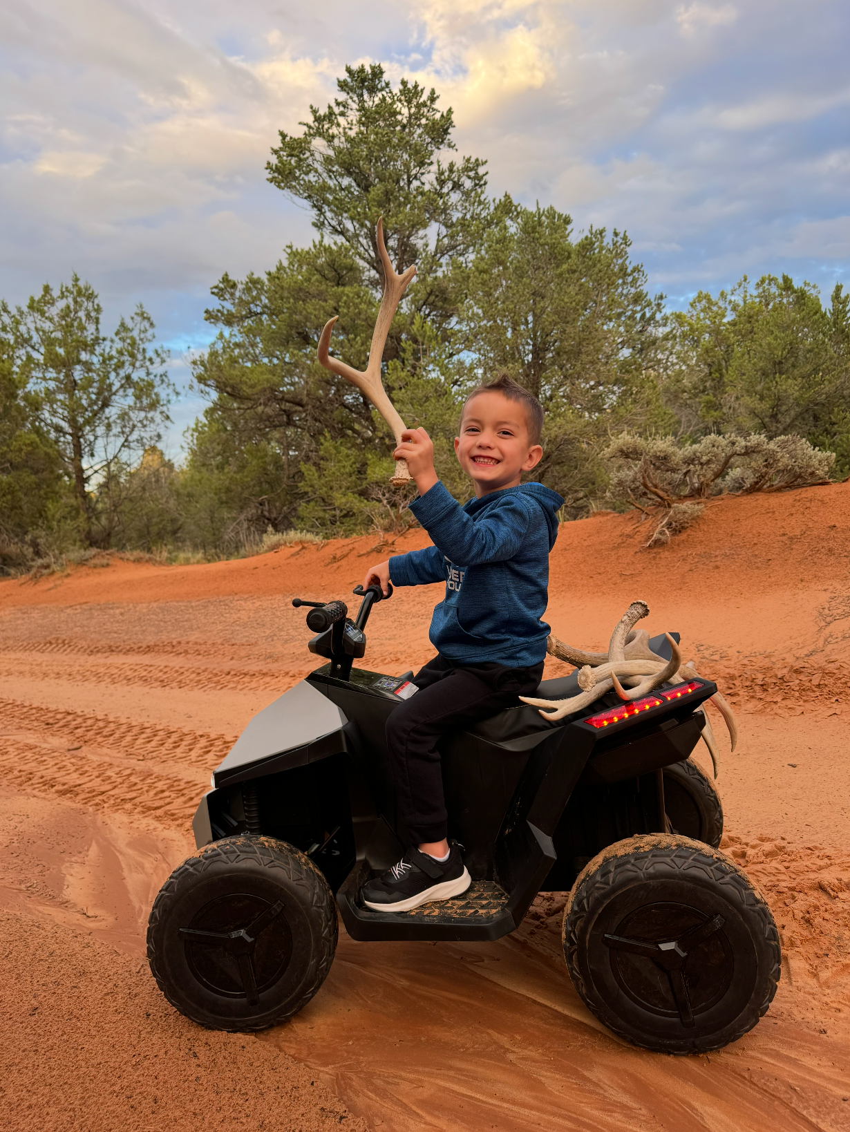 boy riding ride-on ATV Quad